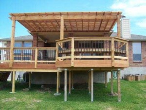 back deck with pergola and hexagon seating area