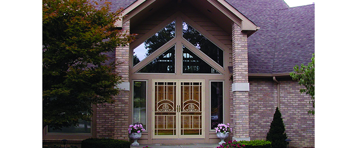 mission style arts and crafts style front entry door with geometric windows above double wood door